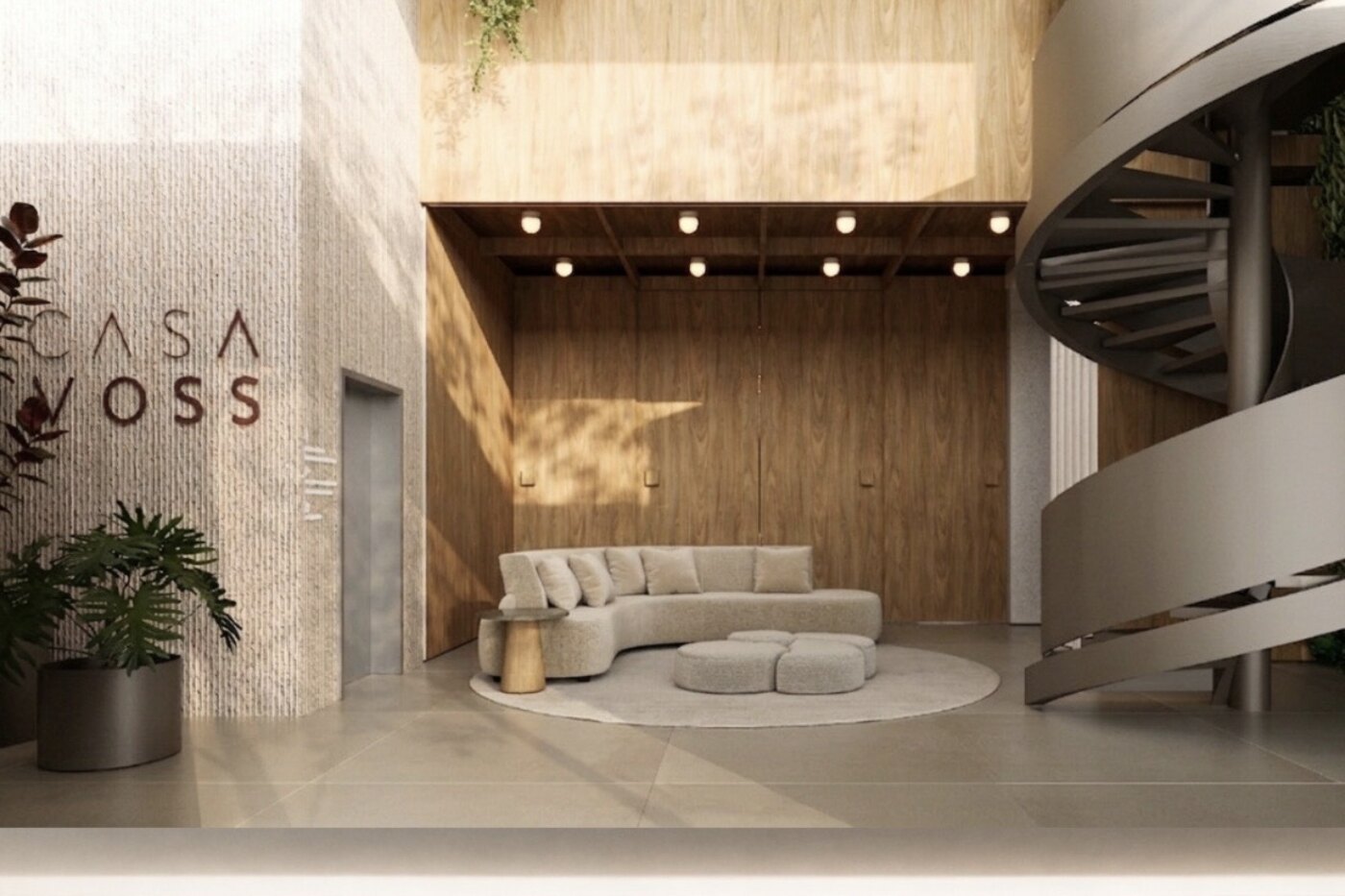 Lounge de entrada, com sofá curvo e escada em caracol.